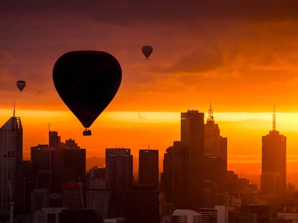 Floating above the melbourne skyline in a hot air balloon